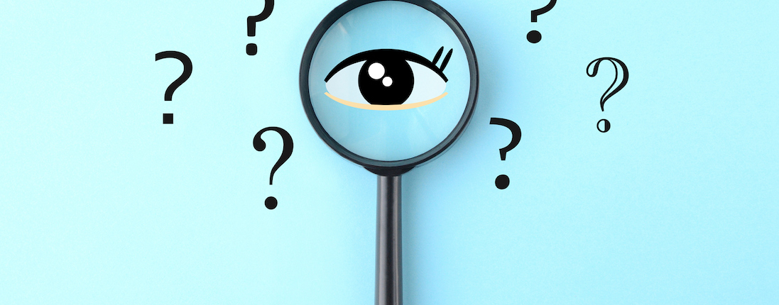 Eye clip art and magnifying glass with question marks